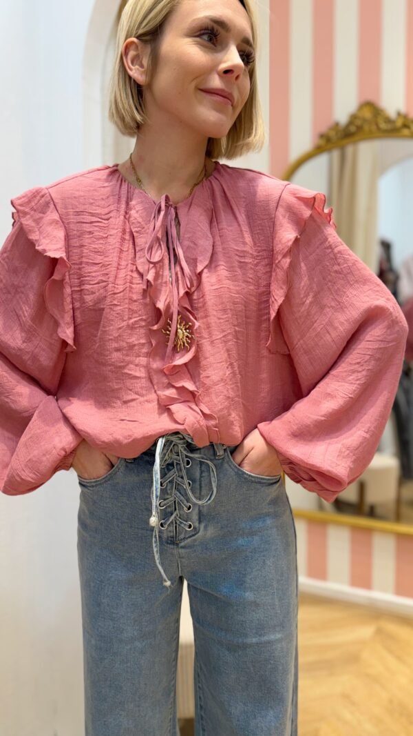Blouse fluide rose avec soleil